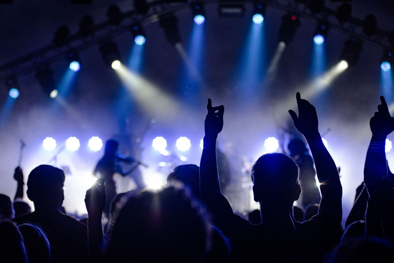 Festival crowd with stage lights